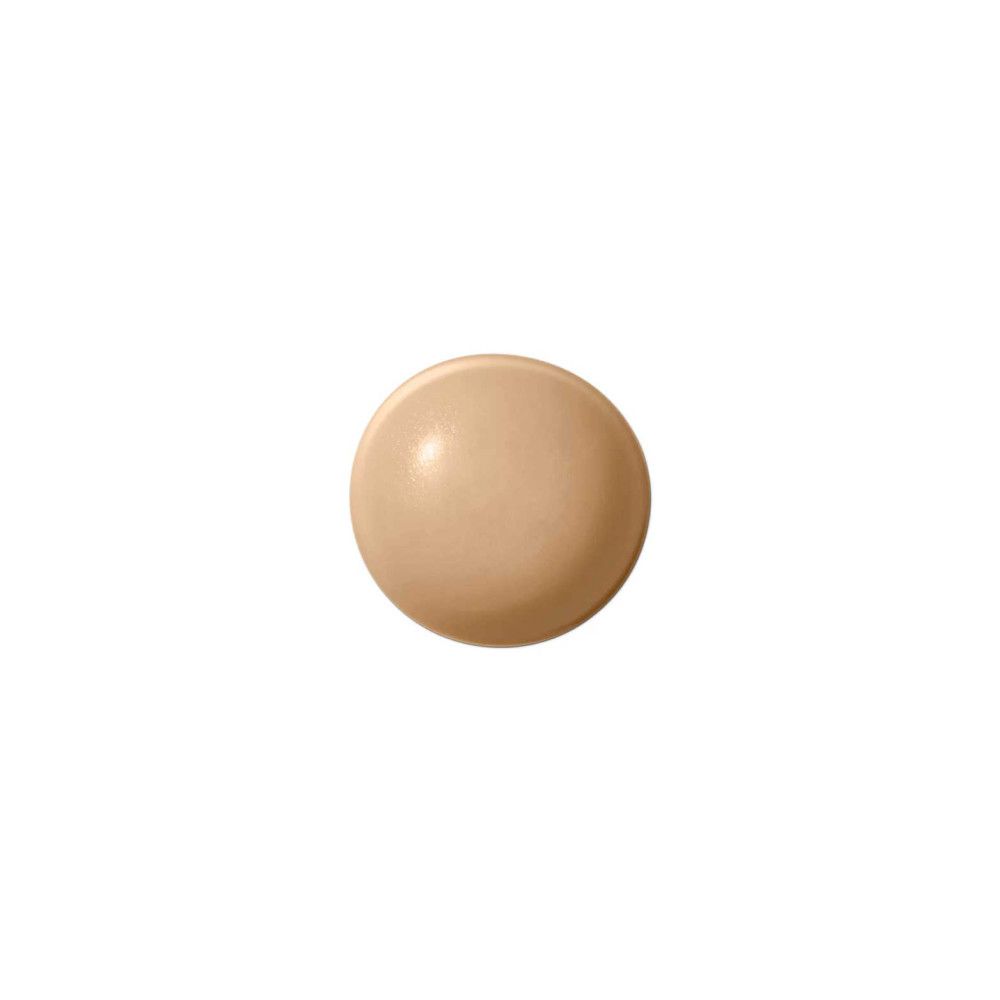 Teinte ronde beige. Produit pour la démonstration de la couleur. Sur fond blanc.