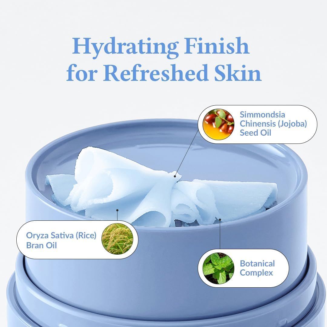 Produit avec lingettes. Texte: Fini hydratant pour une peau rafraîchie. Ingrédients: Huile de jojoba, huile de riz, complexe botanique.
