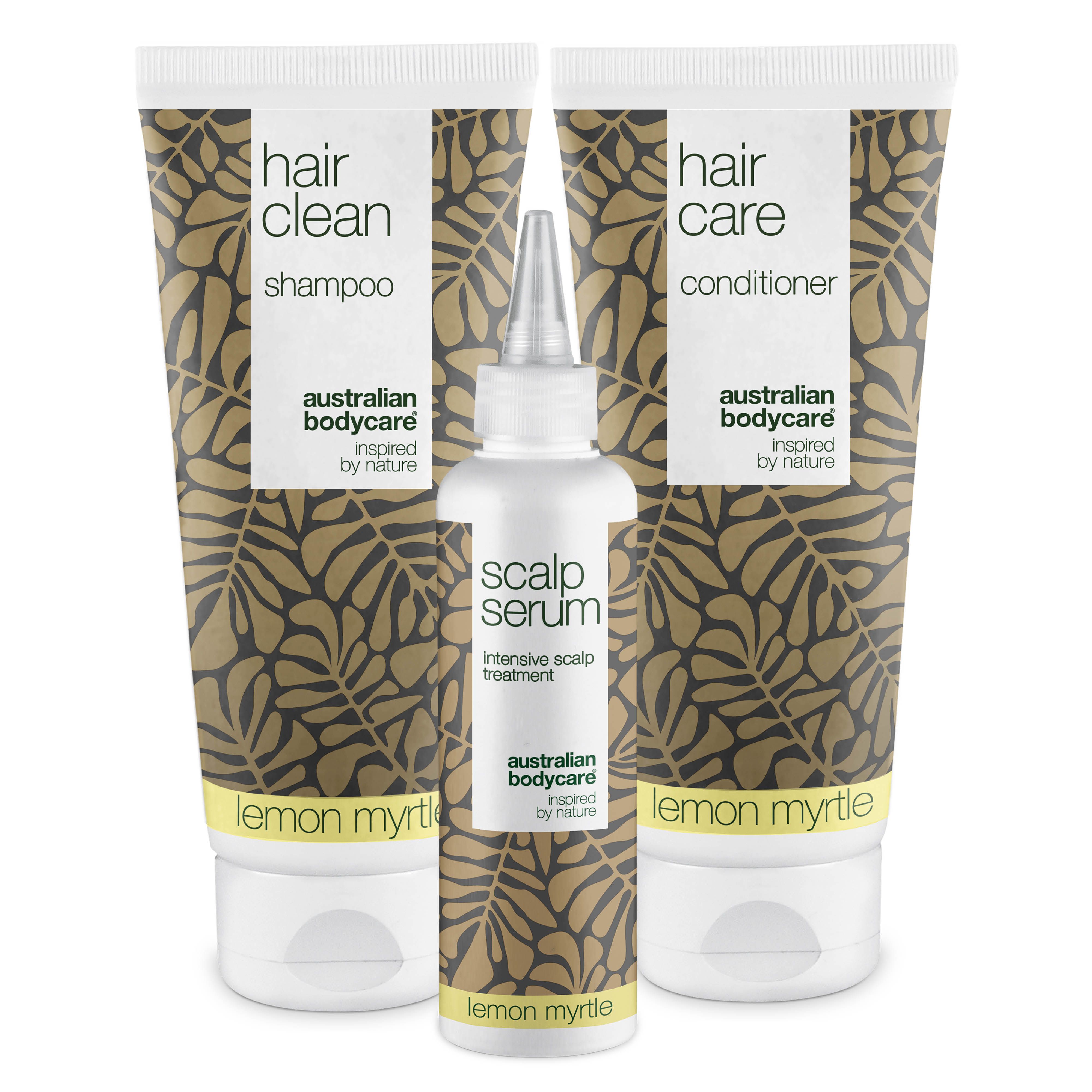 Trois produits : shampooing, après-shampooing et sérum. Tubes et flacon blanc-brun avec texte. Impression jaune : Lemon Myrtle.