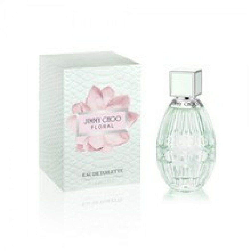 Parfumfles en doos. Ovale, transparante fles. Witte doos met roze bloemmotief en productnaam.
