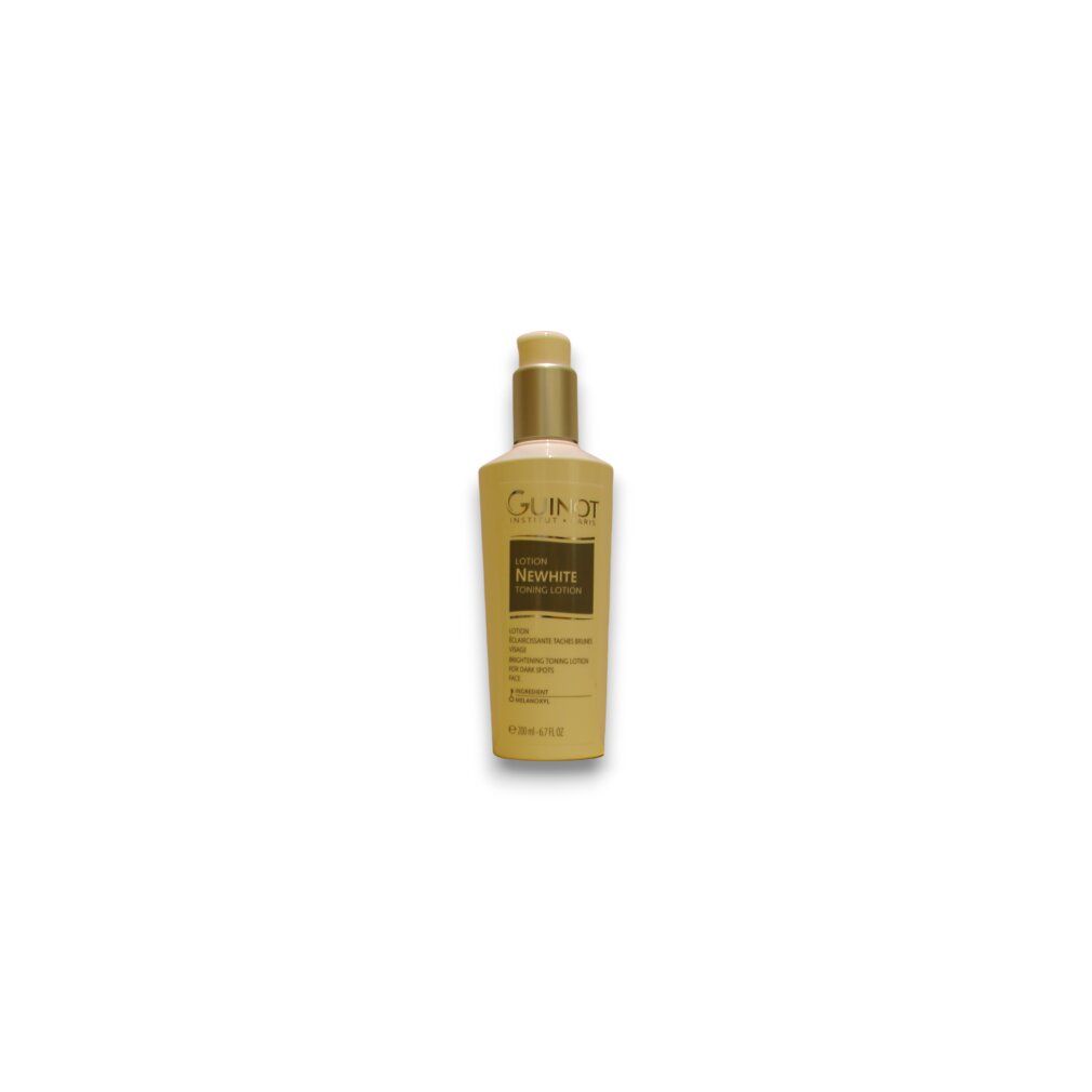 Beige fles met gouden pomp. Opschrift NEWWHITE. Merk Guinot. Productnaam niet volledig leesbaar.