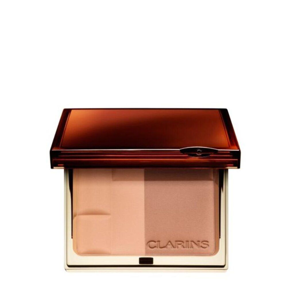 Compactpoeder met twee tinten. Bruine behuizing met gouden rand. Merk Clarins.