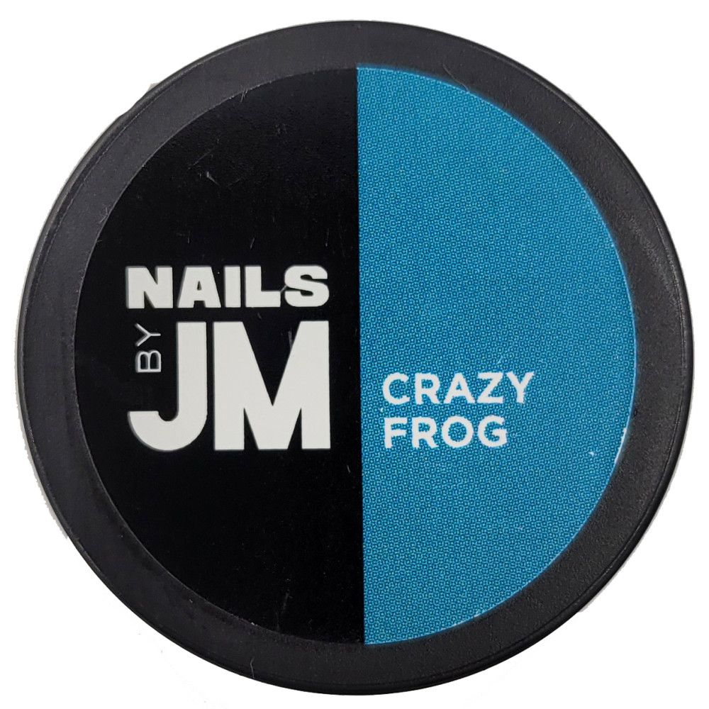 Contenant rond, divisé en noir et bleu. Sur le noir, "NAILS BY JM". Sur le bleu, "CRAZY FROG".