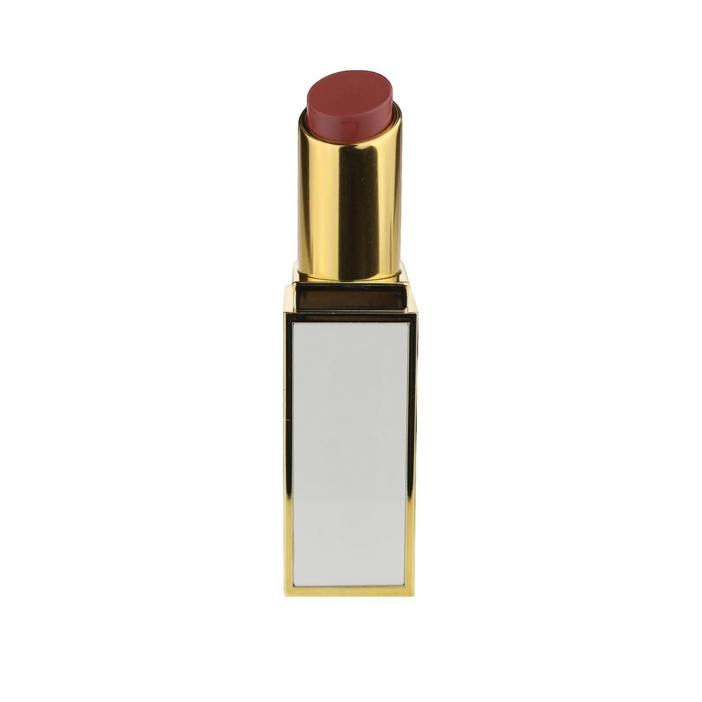 Rouge à lèvres rose. Boîtier doré avec corps rectangulaire blanc. Ouvert, bâton visible.