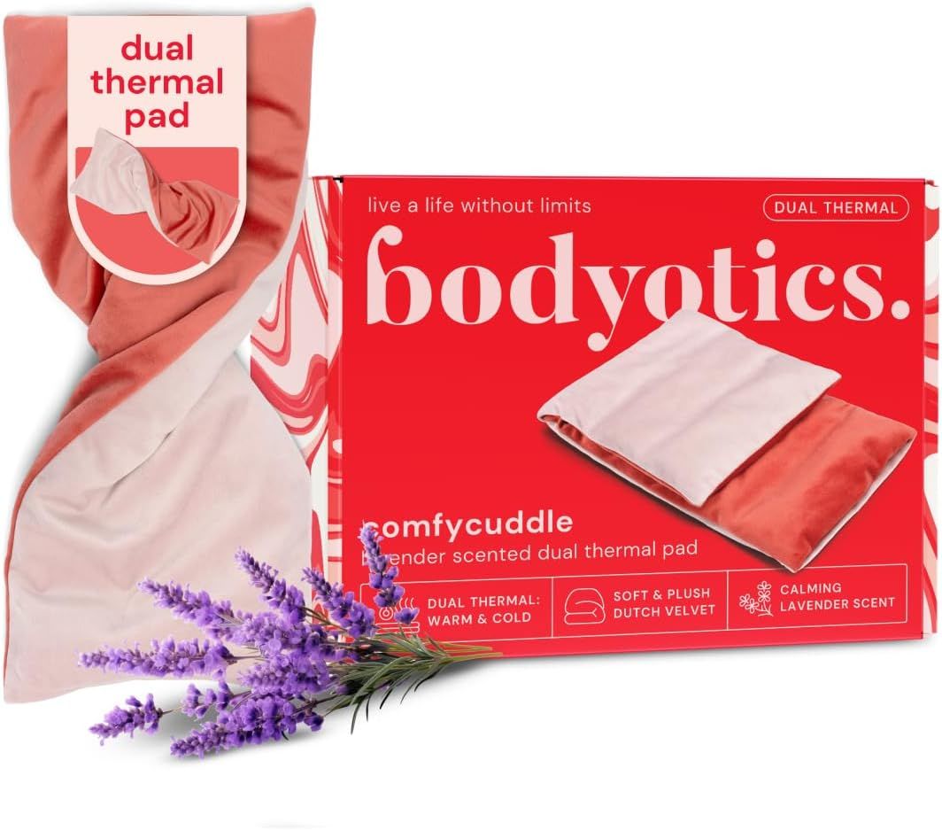 Coussin thermique double face, orange et blanc, avec emballage. Inscriptions : Bodyotics, Comfycuddle, Dual Thermal Pad.