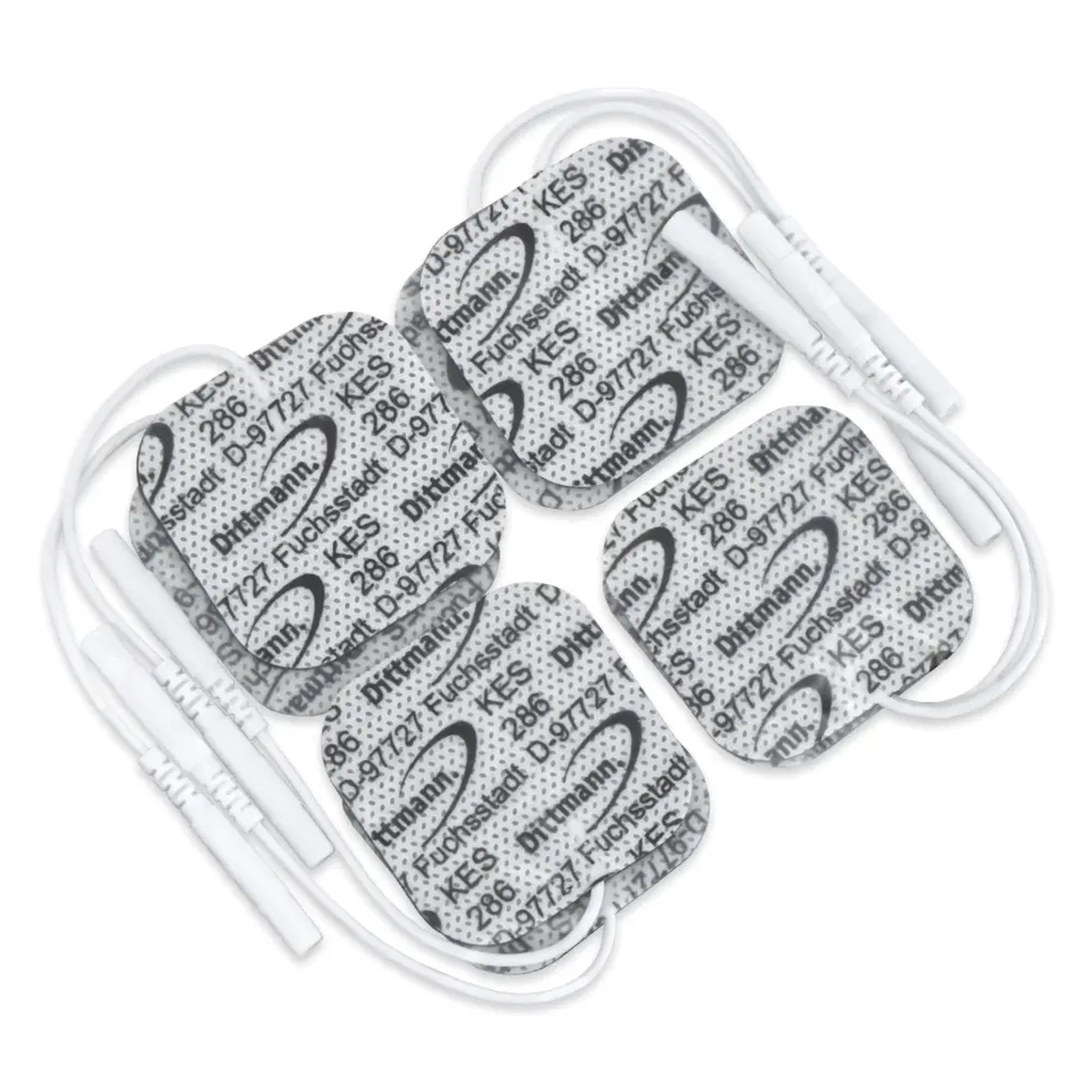 Quatre électrodes carrées avec câbles. Chaque électrode porte l'inscription "Dittmann KES 286".