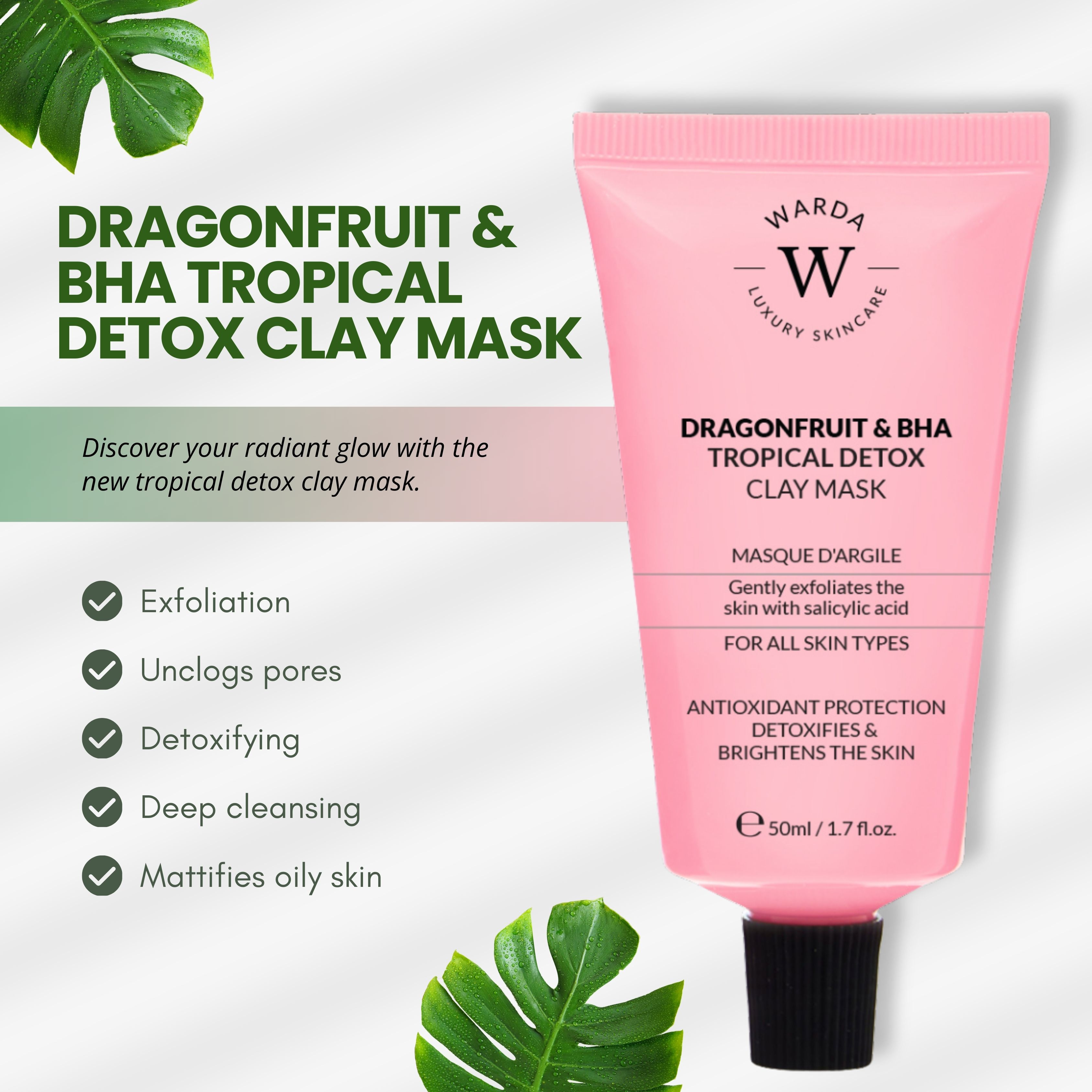 Tube rose et bouchon noir. Inscription: Dragonfruit & BHA Tropical Detox Clay Mask. 50ml. Feuilles en arrière-plan.
