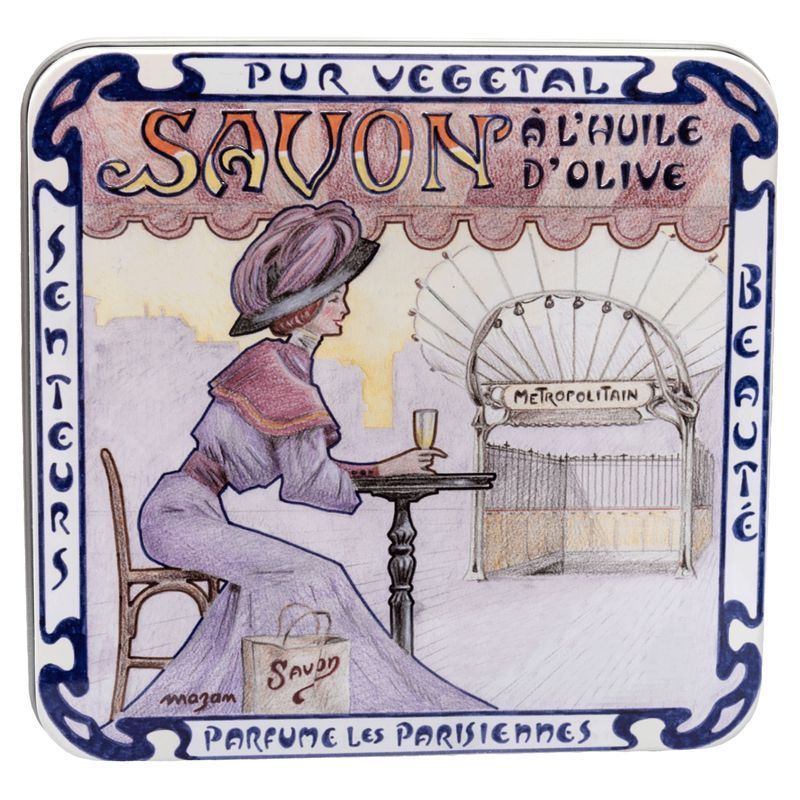 Boîte métallique avec illustration d'une femme devant une entrée de métro. Inscription : Savon à l'huile d'olive.