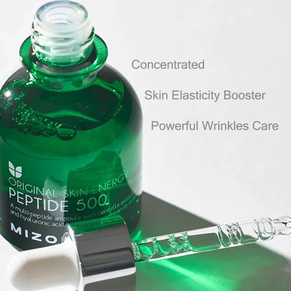 Groene glazen fles met pipet. Opschrift: ORIGINAL SKIN ENERGY PEPTIDE 500, MIZON. Extra tekst: Concentrated, Skin Elasticity Booster, Powerful Wrinkles Care.
