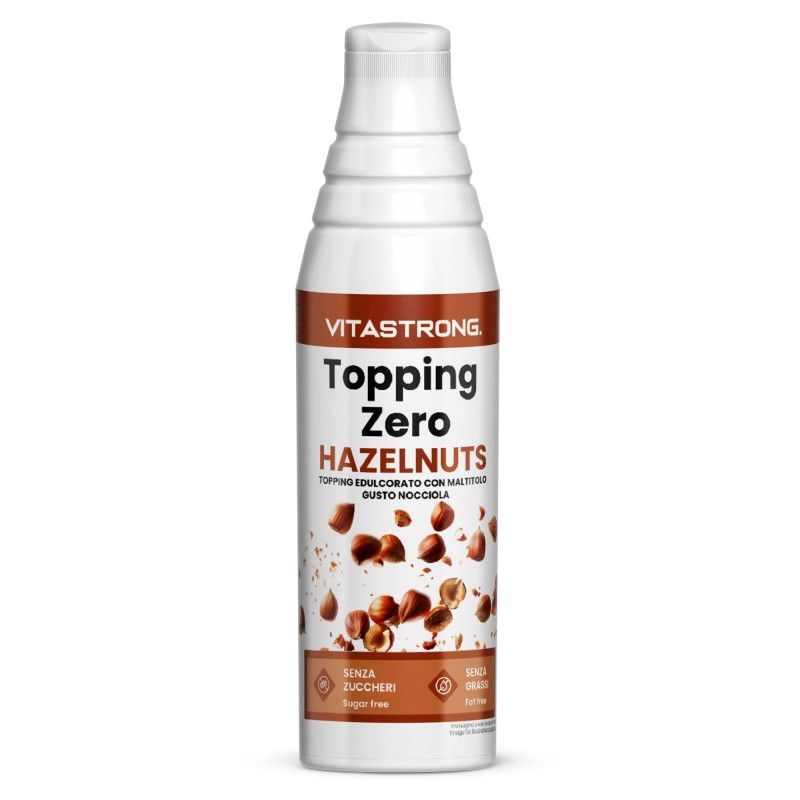 Fles Topping Zero Hazelnuts. Opschrift: Suikervrij, vetvrij. Hazelnoten afgebeeld.