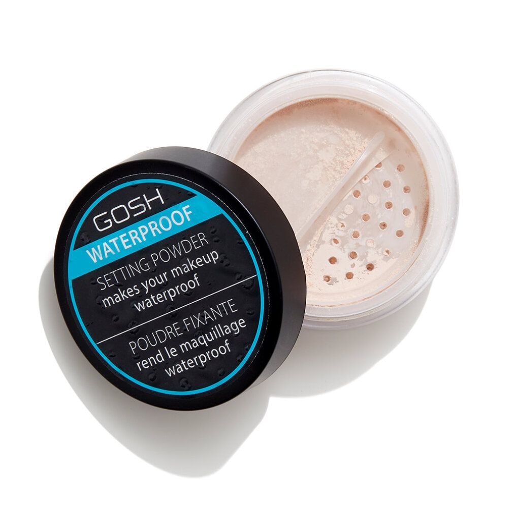 Boîte ouverte avec couvercle noir. Inscription GOSH WATERPROOF SETTING POWDER. Poudre avec trous. Couvercle à côté.