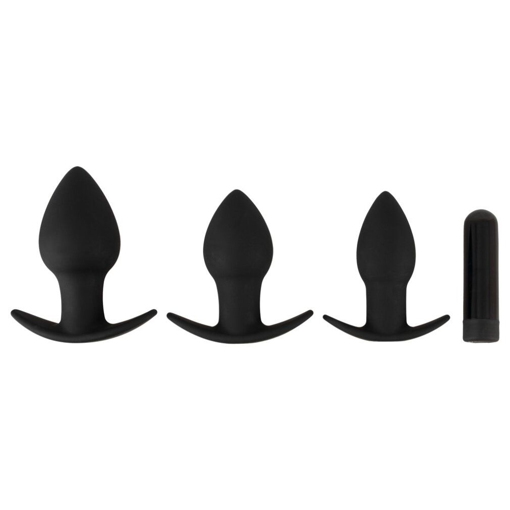 Trois plugs anaux noirs en silicone de différentes tailles et un vibromasseur bullet alignés.