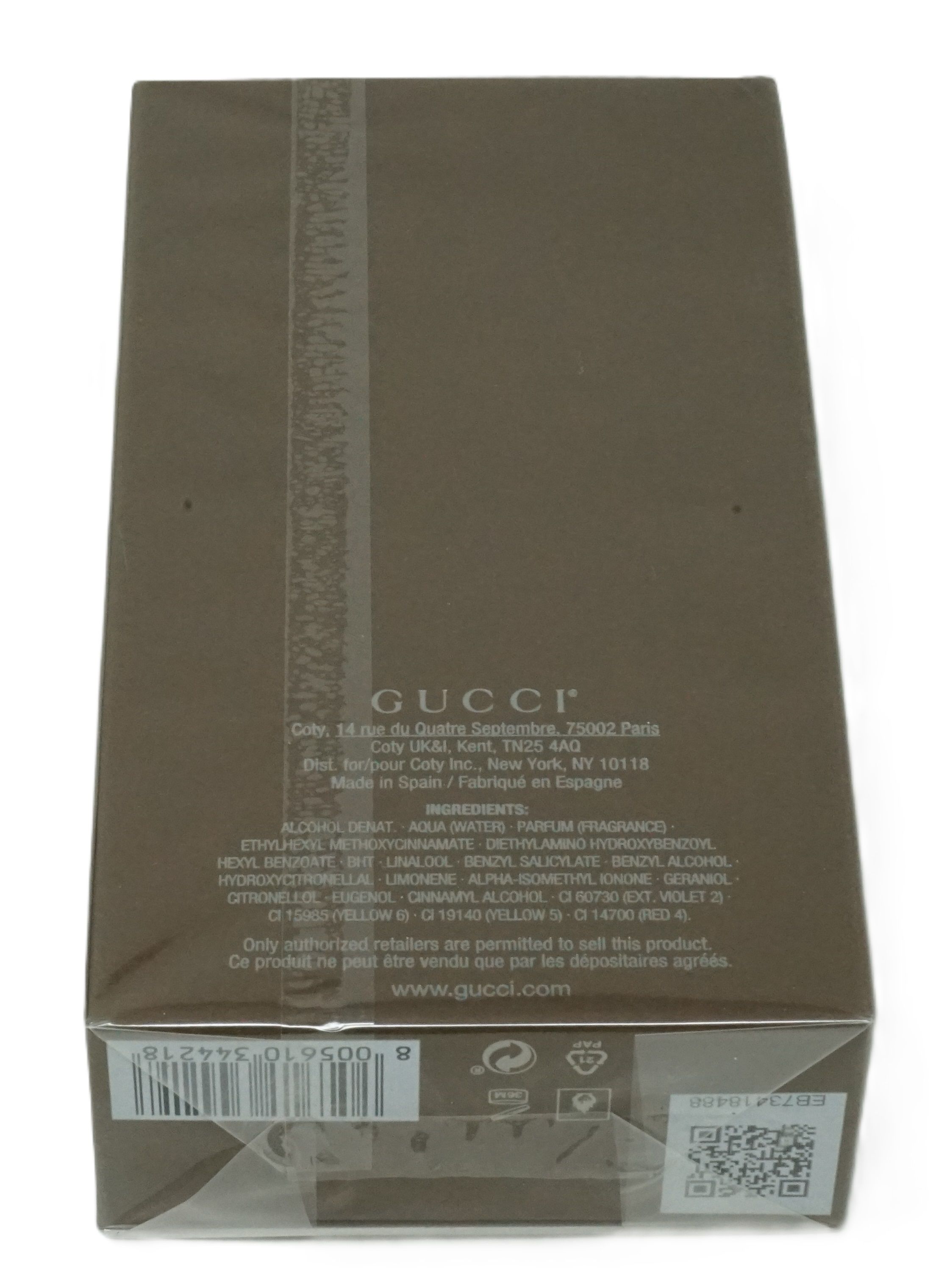 Gucci Guilty Absolute Pour Homme Eau De Parfum verpakking. Bruin, tekst en barcode. Fabrikantinfo en QR-code.