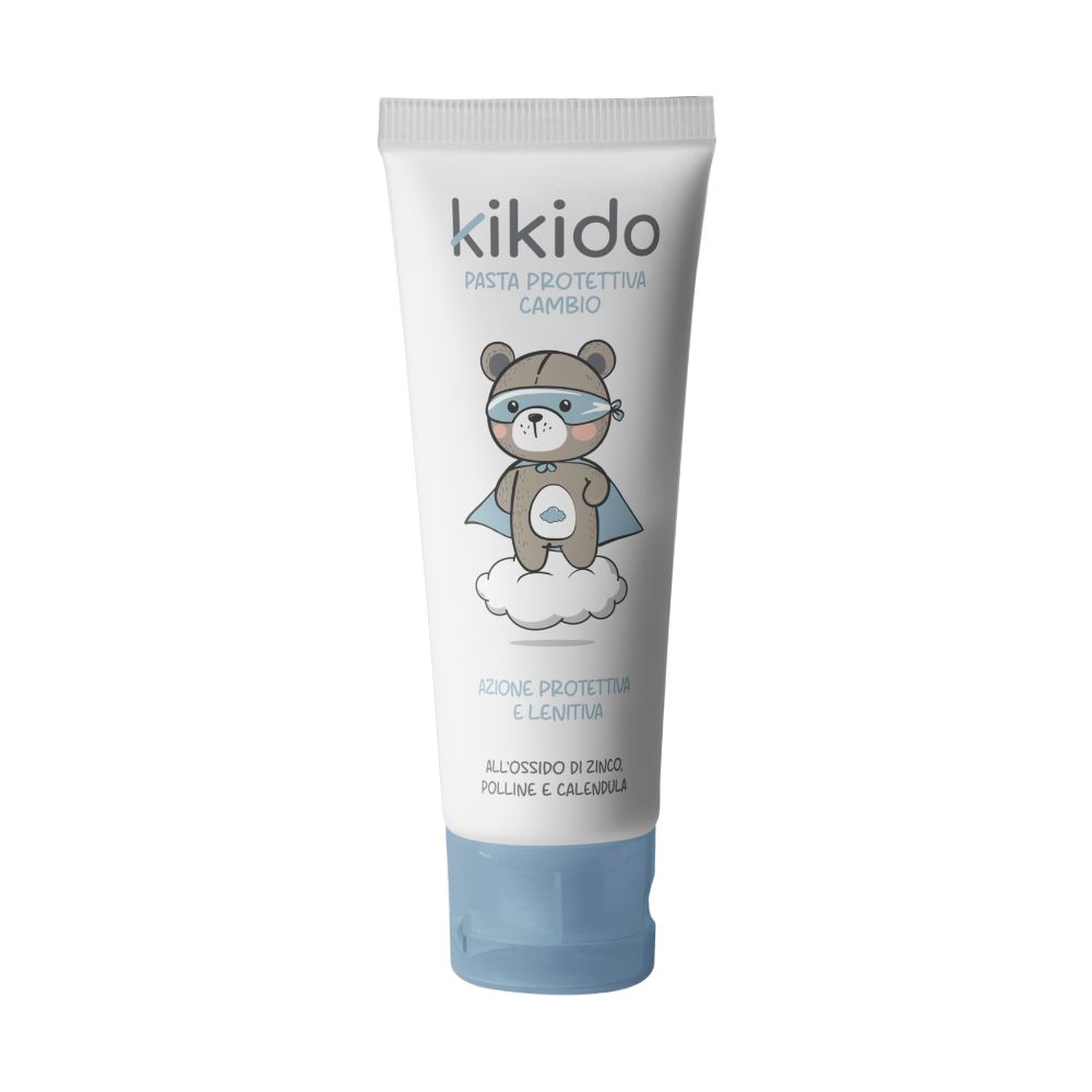 Tube blanc avec bouchon bleu. Inscription "kikido" et illustration d'un ours. Texte : Pasta Protettiva Cambio, Azione Protettiva e Lenitiva.
