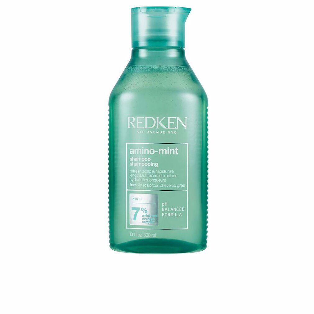 Groene Redken Amino Mint shampoo fles. Tekst: pH-gebalanceerd, 300 ml. Bevat 7% actieve ingrediënten.