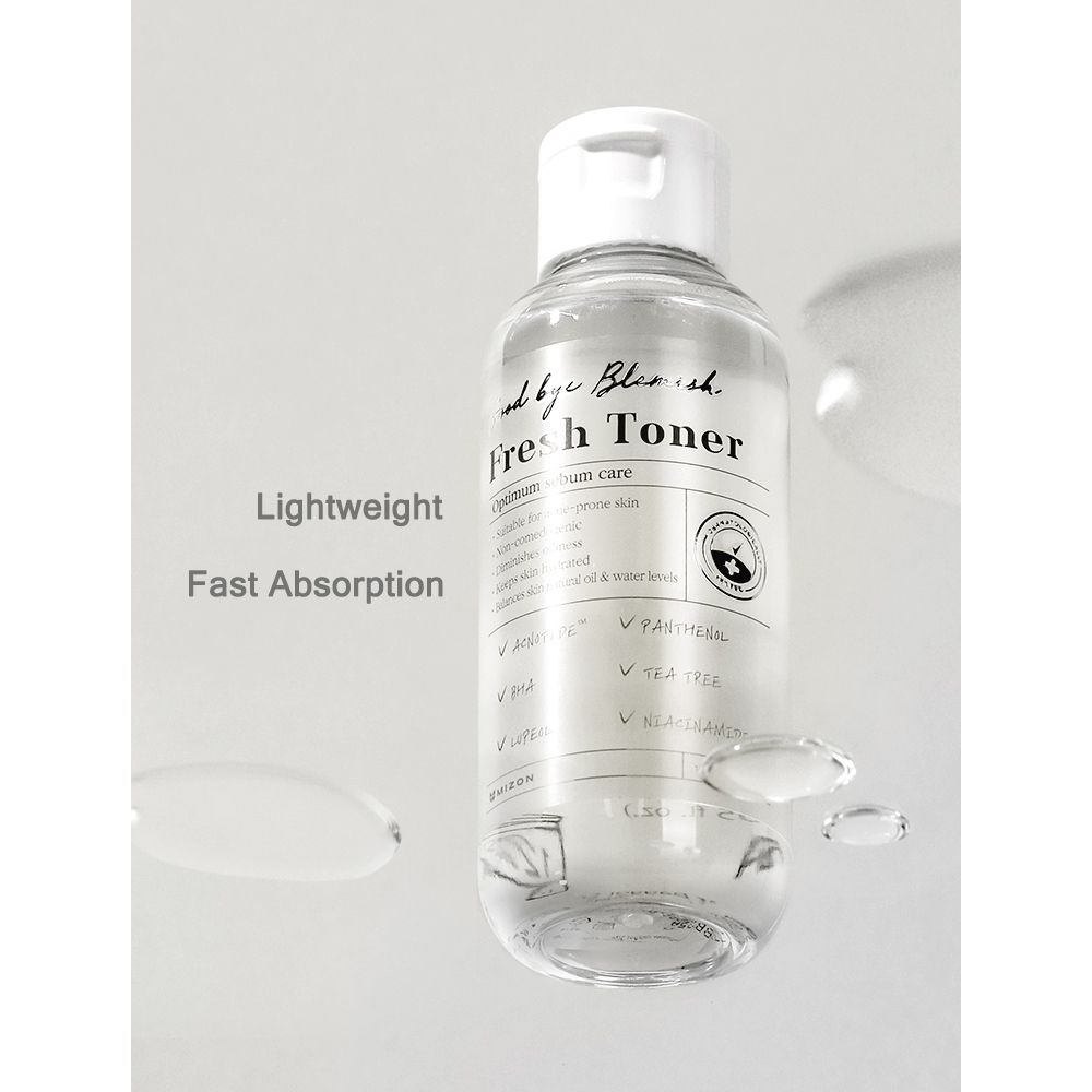 Tonerfles met witte dop. Opschrift: Fresh Toner. Tekst: Lightweight, Fast Absorption. Druppels.