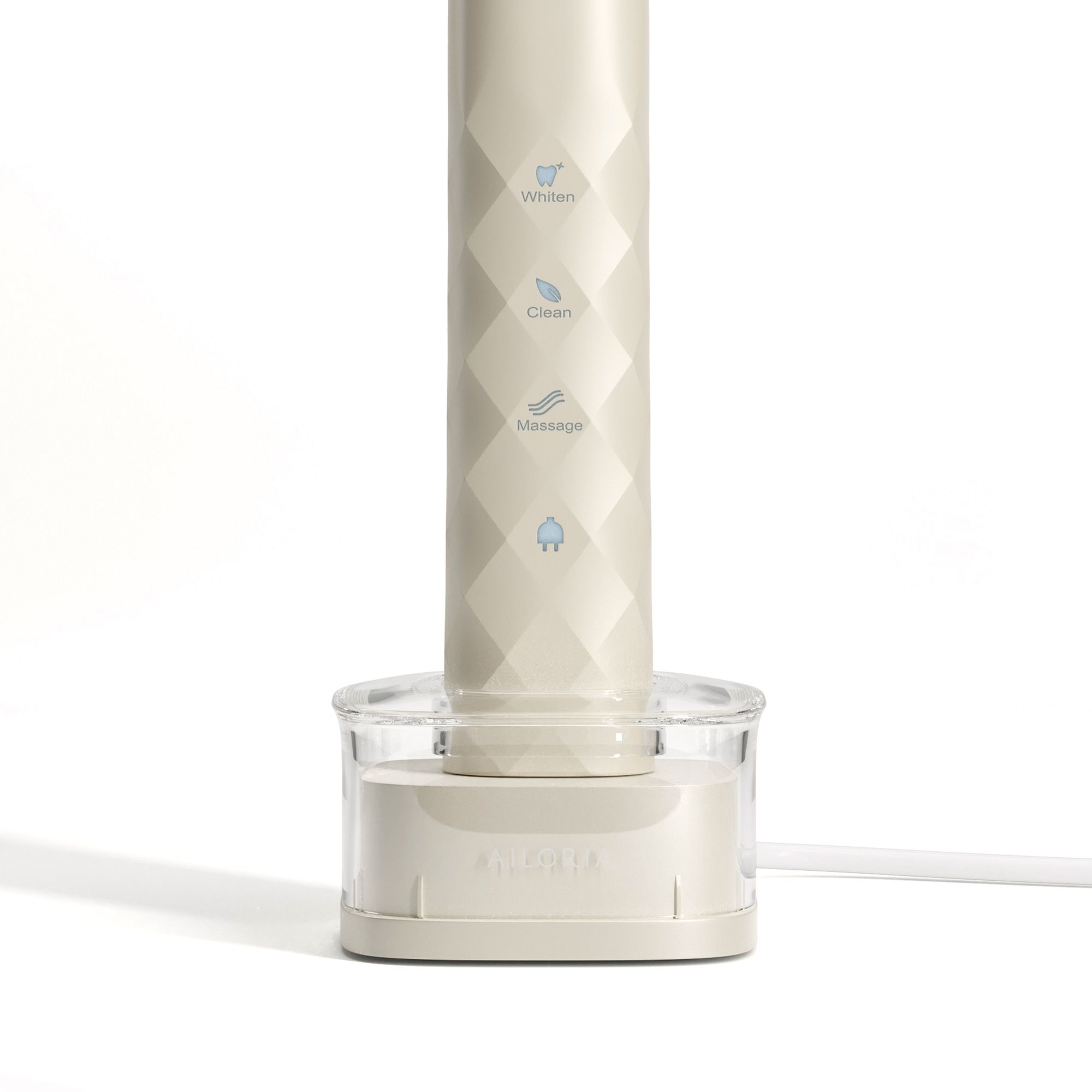 Inductief oplaadstation met tandenborstelhandvat. Symbolen voor verschillende standen op het handvat.