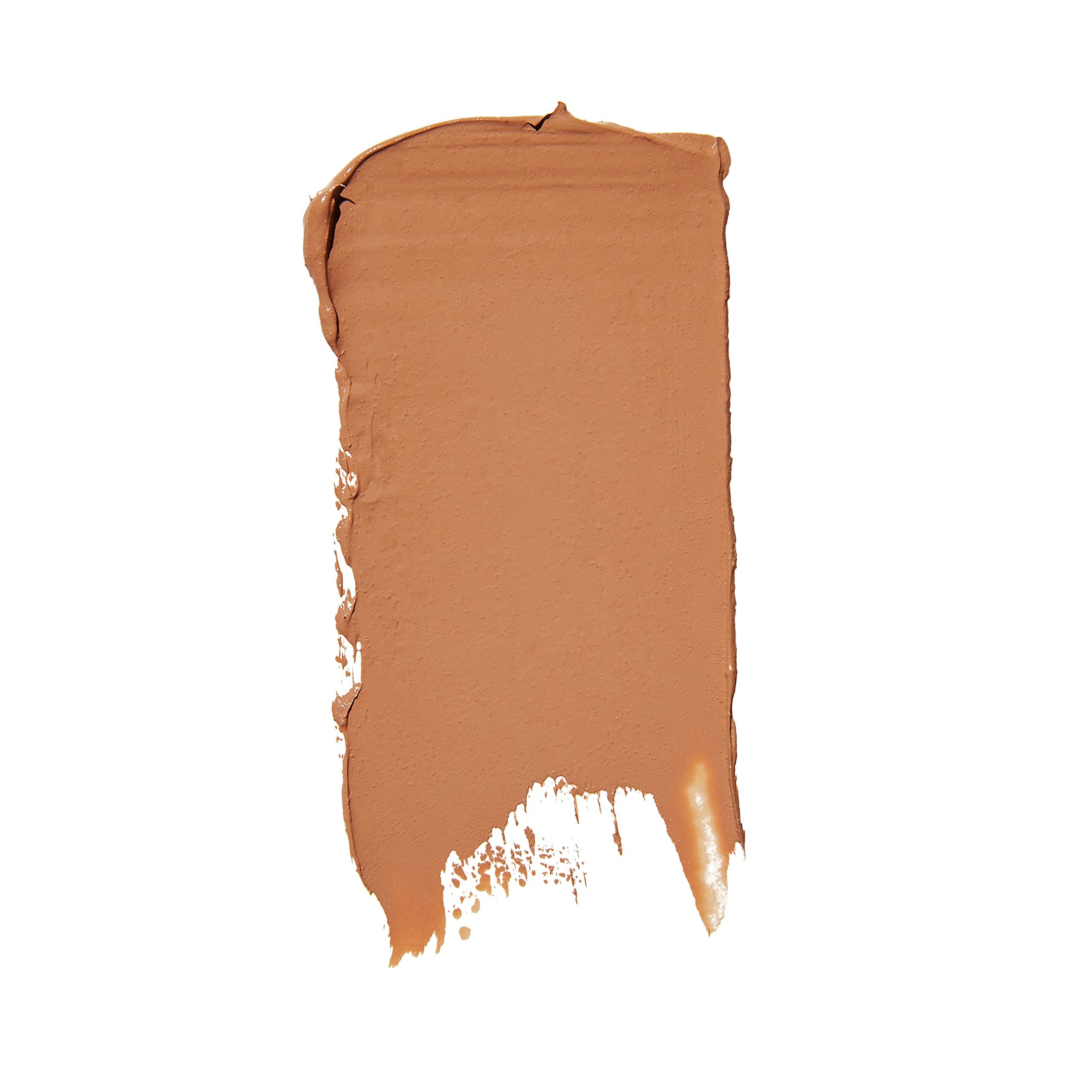 Trait de maquillage brun clair sur fond blanc. Texture visible.