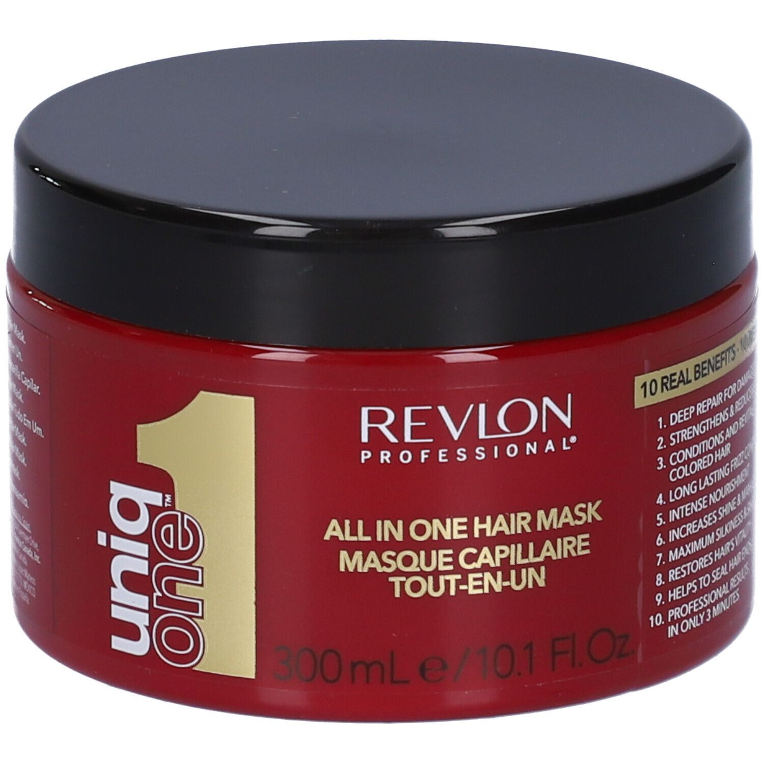 Pot rouge avec couvercle noir. Inscription: Revlon Uniq One All in One Hair Mask. 300ml/10.1 Fl.Oz.
