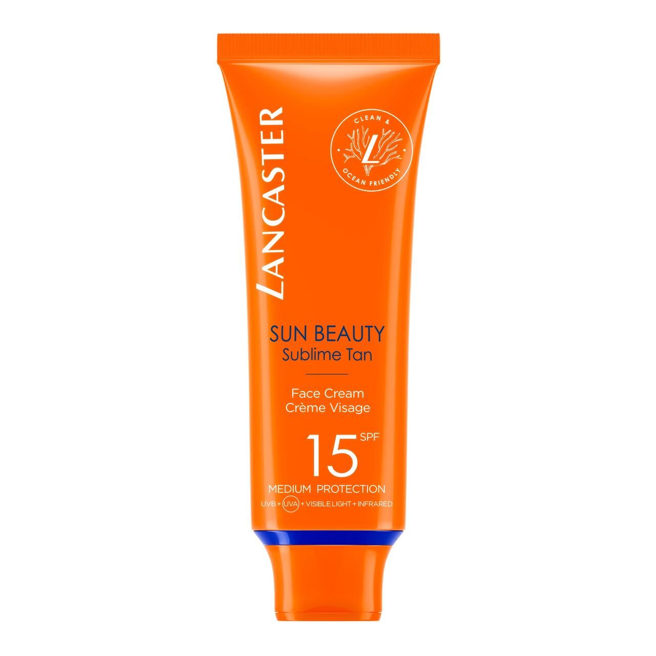 Tube orange avec texte blanc. Lancaster Sun Beauty, SPF 15. Crème visage. Ocean Friendly.