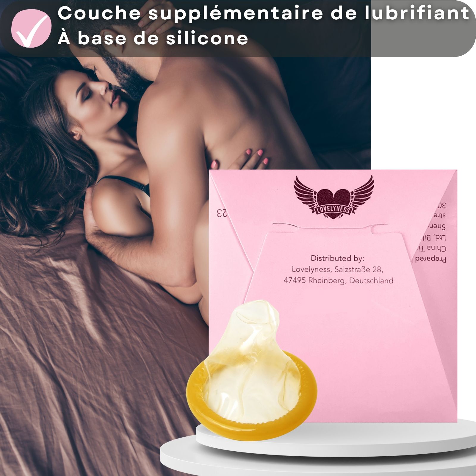 Préservatif et emballage rose. Texte: "Extra Gleitgelschicht auf Silikonbasis".