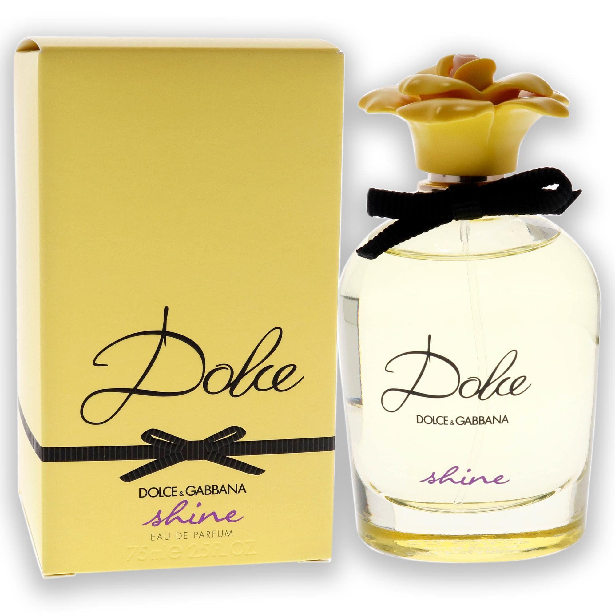 Flacon de parfum et emballage. Emballage jaune avec ruban noir et inscription "Dolce & Gabbana Dolce shine".