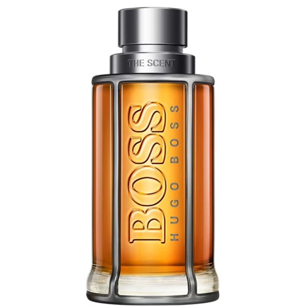 Gouden parfumfles met zilveren dop. Opschriften BOSS en HUGO BOSS. THE SCENT.
