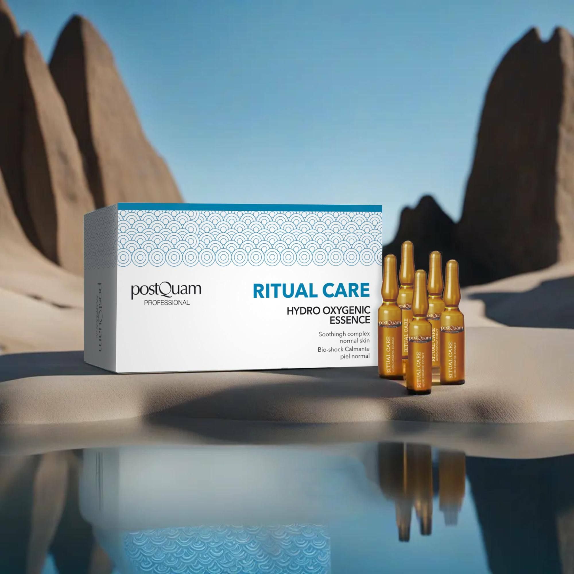 Verpakking met ampullen voor een woestijnlandschap. Opschrift 'Postquam Professional', 'Ritual Care Hydro Oxygenic Essence'.