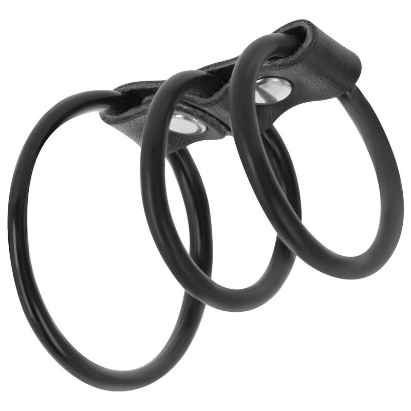 Trois anneaux de pénis noirs et flexibles en silicone, reliés par une bande de cuir avec boutons-pression.