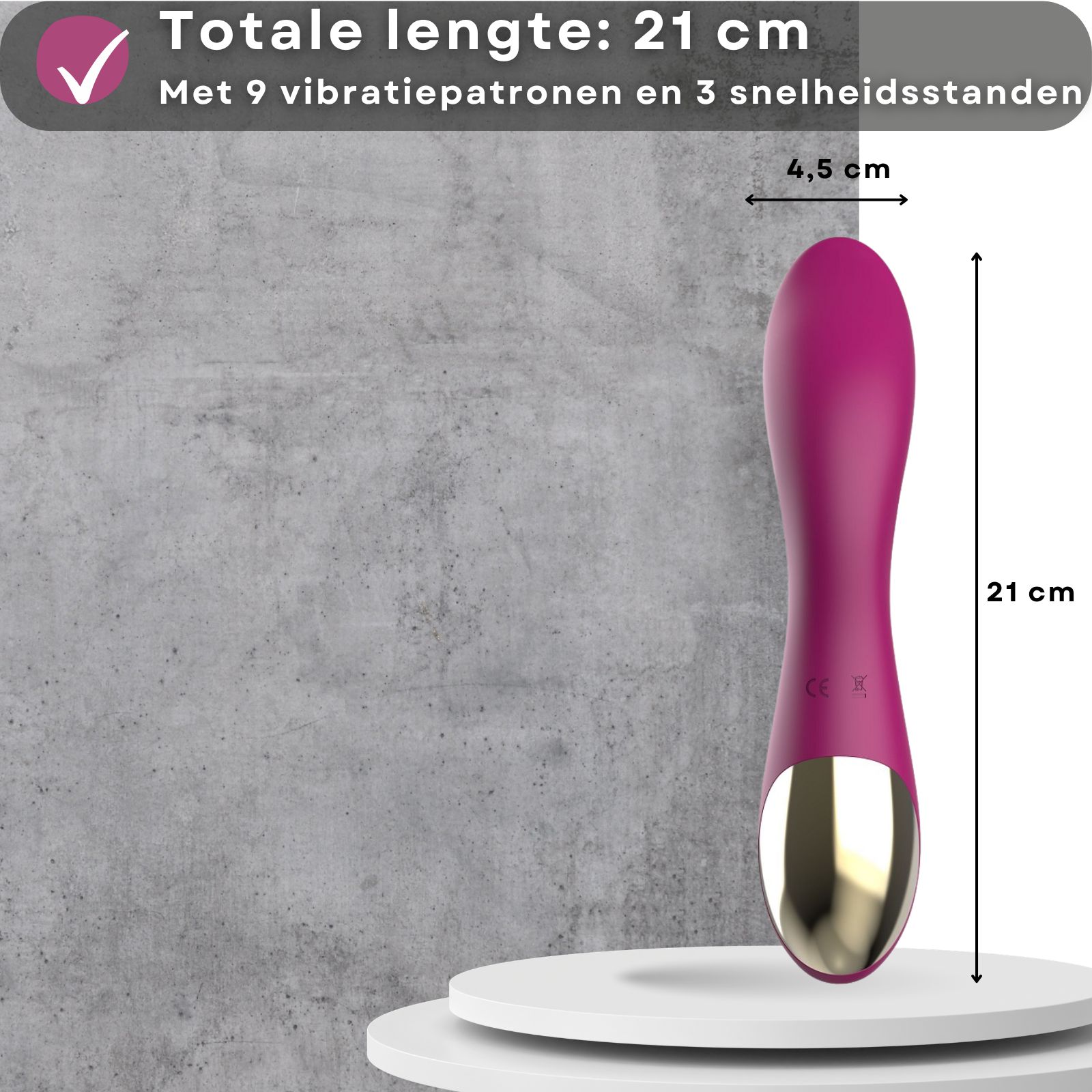 Roze vibrator. Lengte 21 cm, diameter 4,5 cm. Op voetstuk. Gouden accent aan de basis.