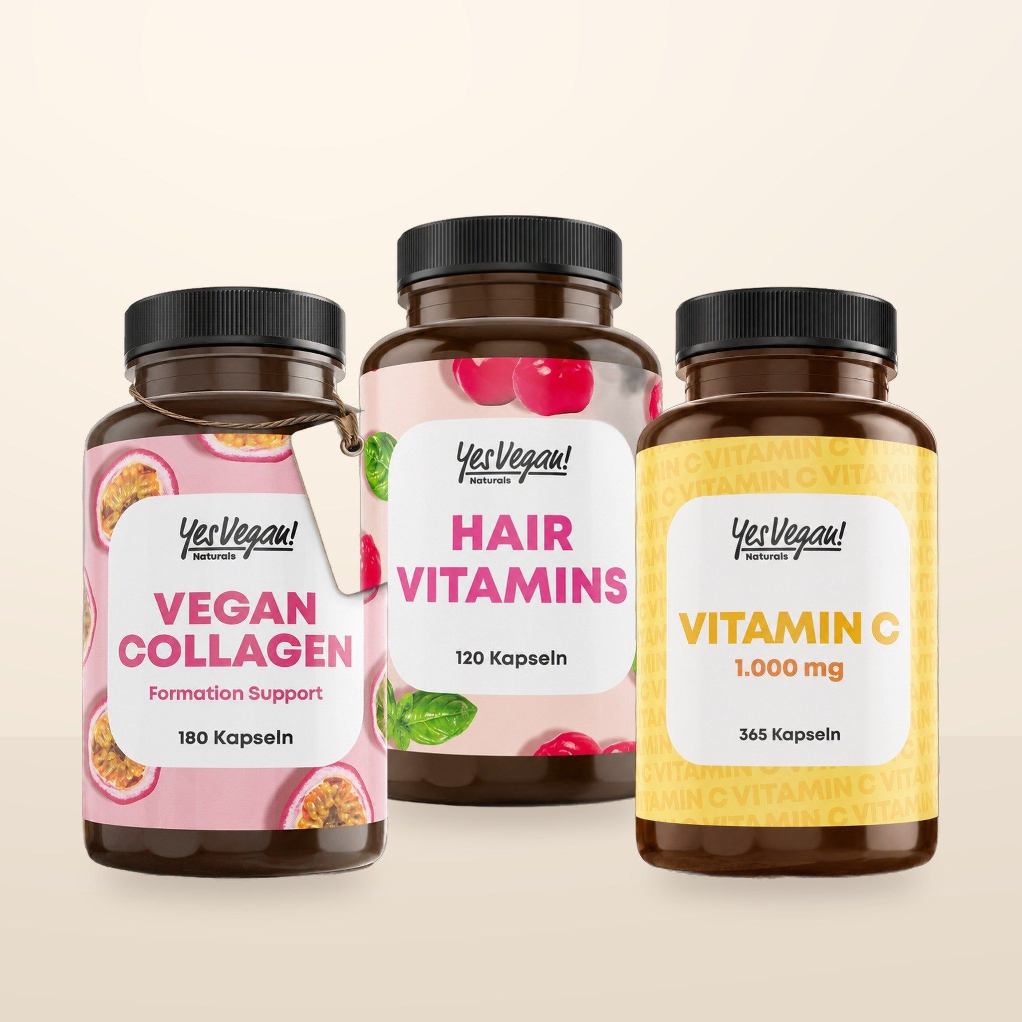 Drie flessen YesVegan! voedingssupplementen: Vegan Collagen, Hair Vitamins en Vitamine C.