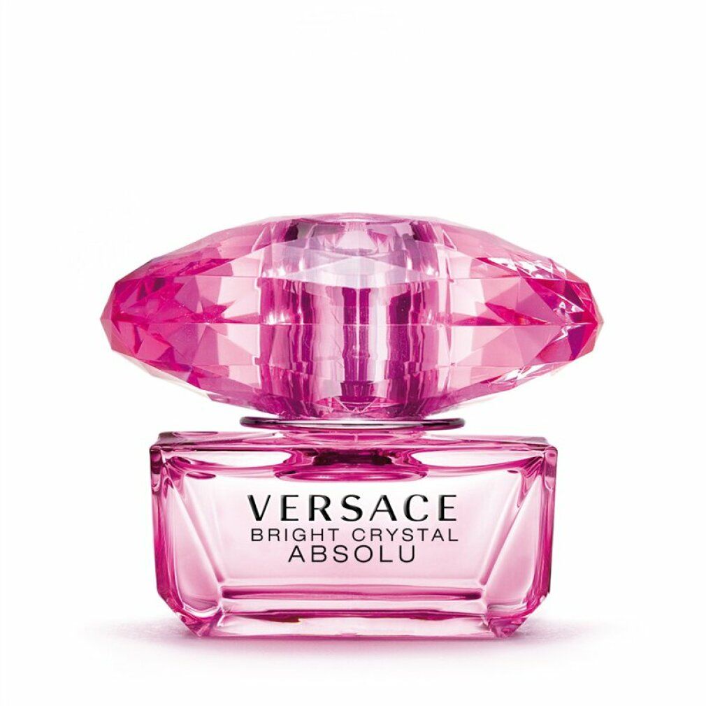 Flacon rose avec bouchon cristal. Inscription: VERSACE BRIGHT CRYSTAL ABSOLU.