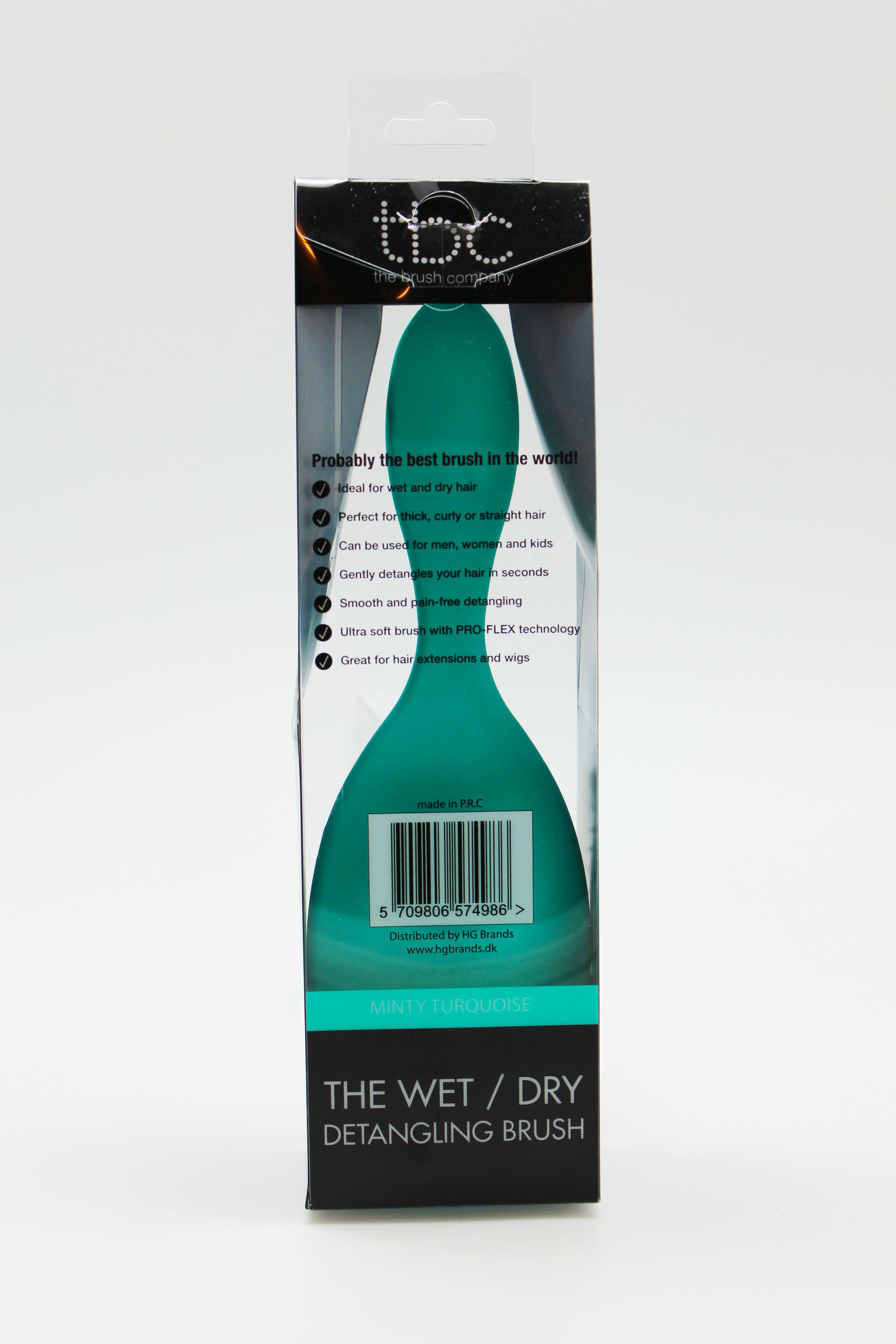 Arrière de la brosse TBC Wet & Dry menthe turquoise dans son emballage.