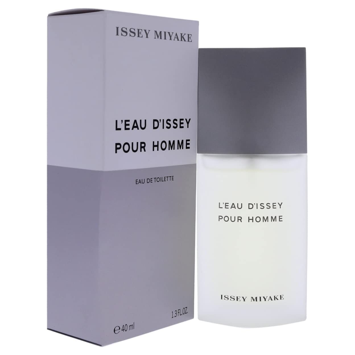 Fles en verpakking. Rechthoekige fles met grijze dop. Wit-paarse verpakking. Opschrift: L'EAU D'ISSEY POUR HOMME en ISSEY MIYAKE.