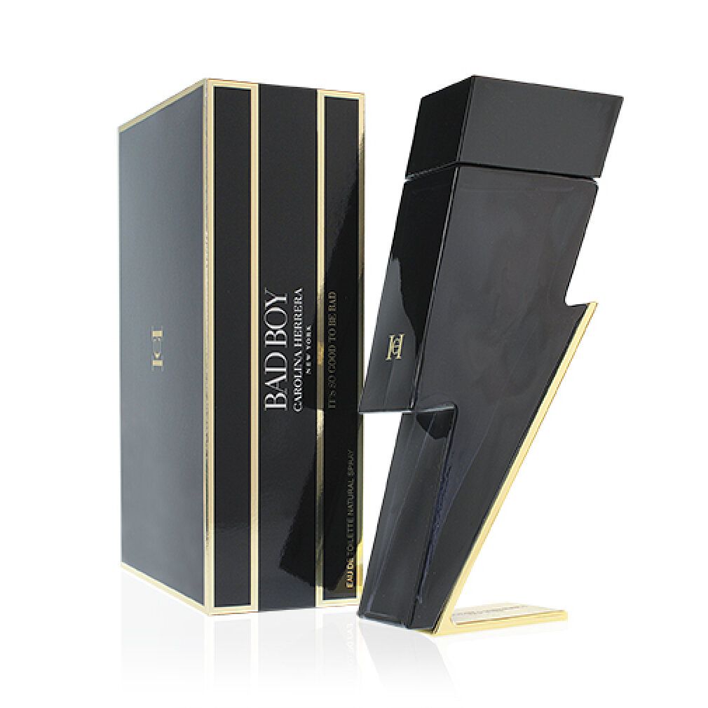 Flacon noir en forme d'éclair avec détails dorés et emballage. Inscription : BAD BOY CAROLINA HERRERA.