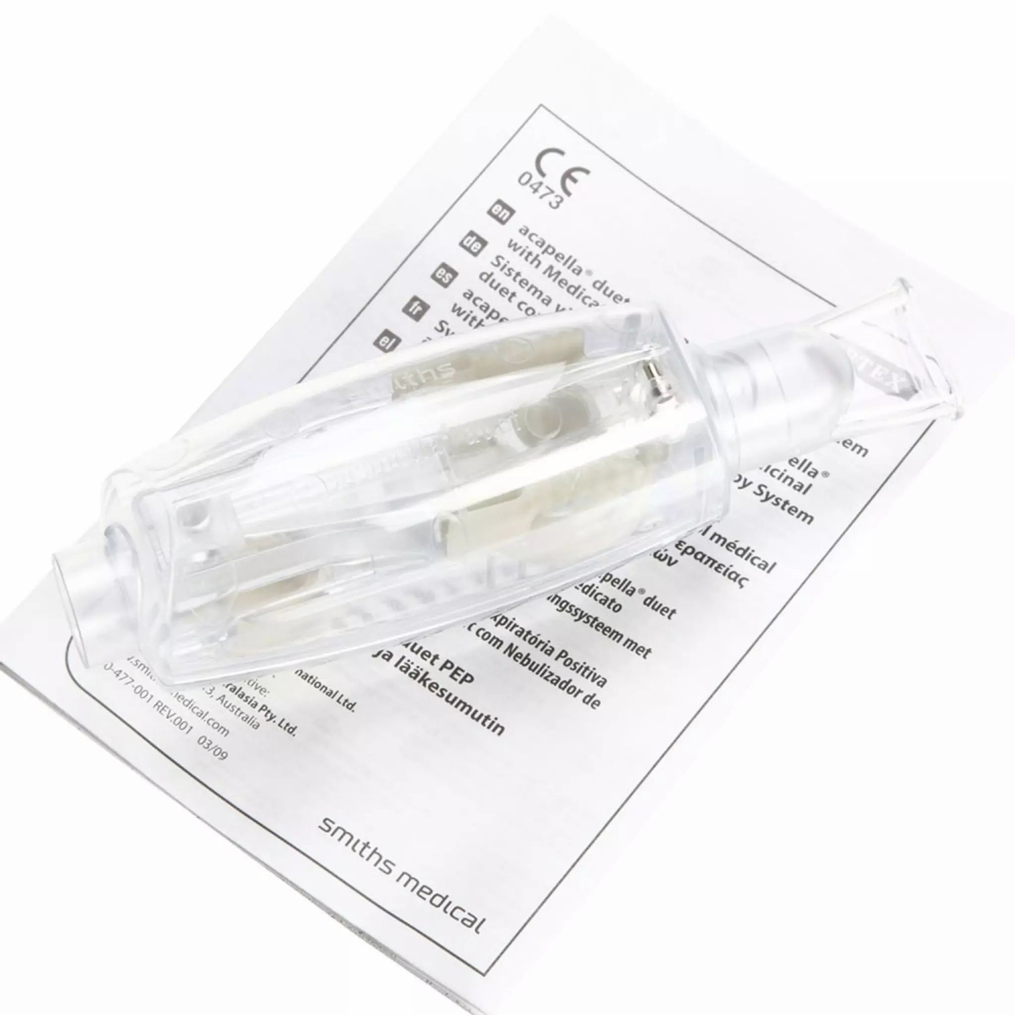 Appareil de physiothérapie respiratoire Acapella Duet dans son emballage transparent avec instructions.