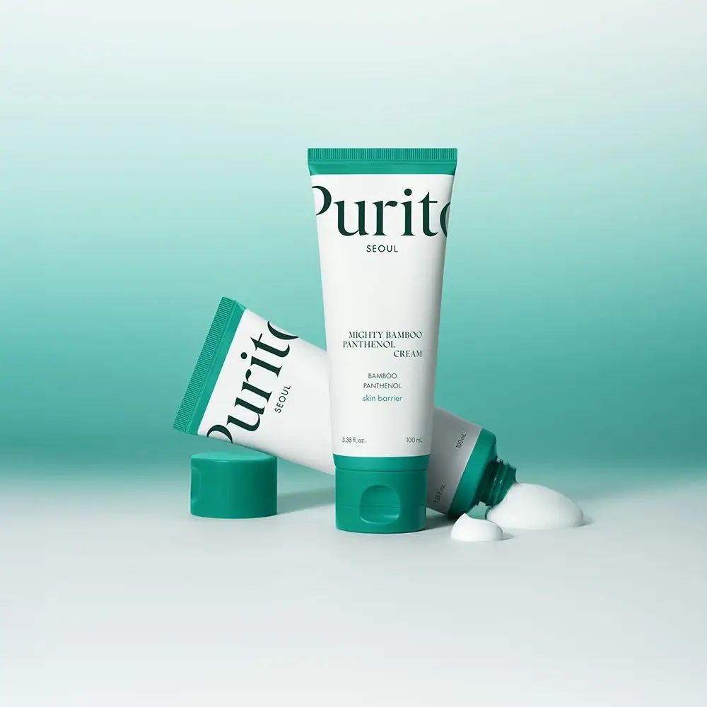 Twee tubes met groene dop. Opschrift: Purito, Seoul, Mighty Bamboo Panthenol Cream. Product ernaast.