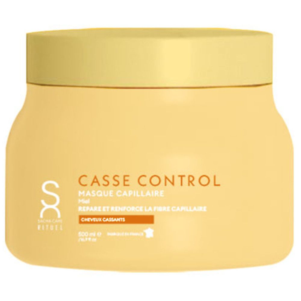 Gele pot met deksel. Tekst: Casse Control, Masque Capillaire, Réparation et Renforce la Fibre Capillaire, 500 ml.