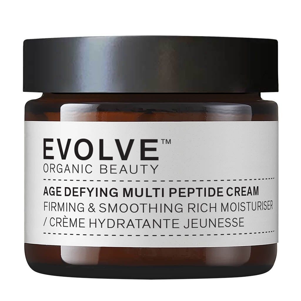 Pot en verre brun avec couvercle noir. Étiquette: EVOLVE ORGANIC BEAUTY, Age Defying Multi Peptide Cream. Crème pour le visage.