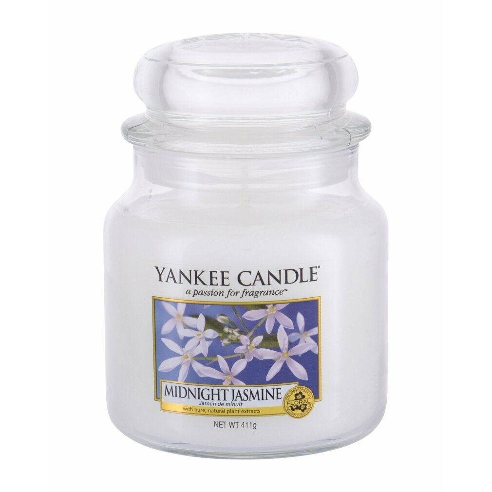 Yankee Candle Midnight Jasmine geurkaars. Glazen pot met deksel. Blauw etiket met bloemen. Gewicht: 411g.