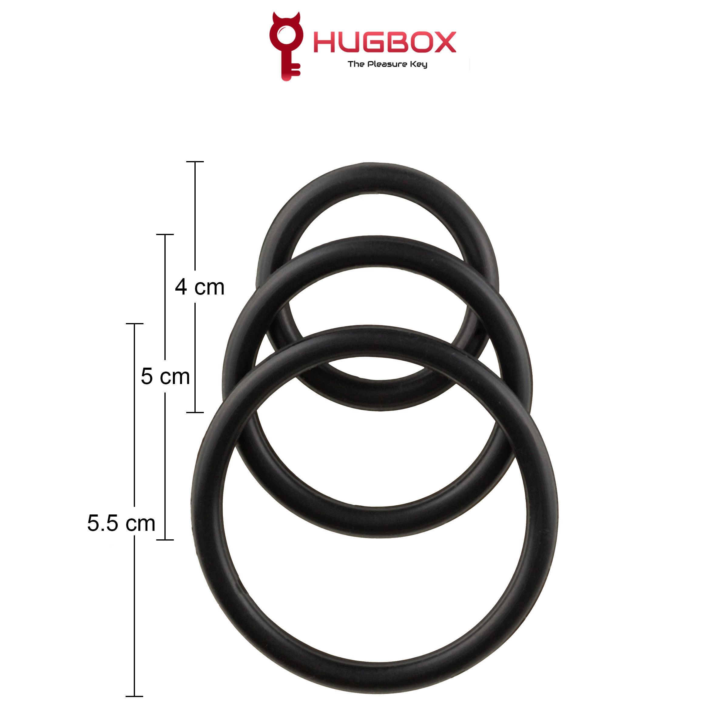 Drie zwarte ringen verbonden. Afmetingen: 4 cm, 5 cm, 5,5 cm. HUGBOX logo.