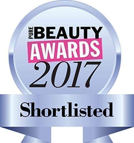 Badge rond avec l'inscription 'PURE BEAUTY AWARDS 2017 Shortlisted'.
