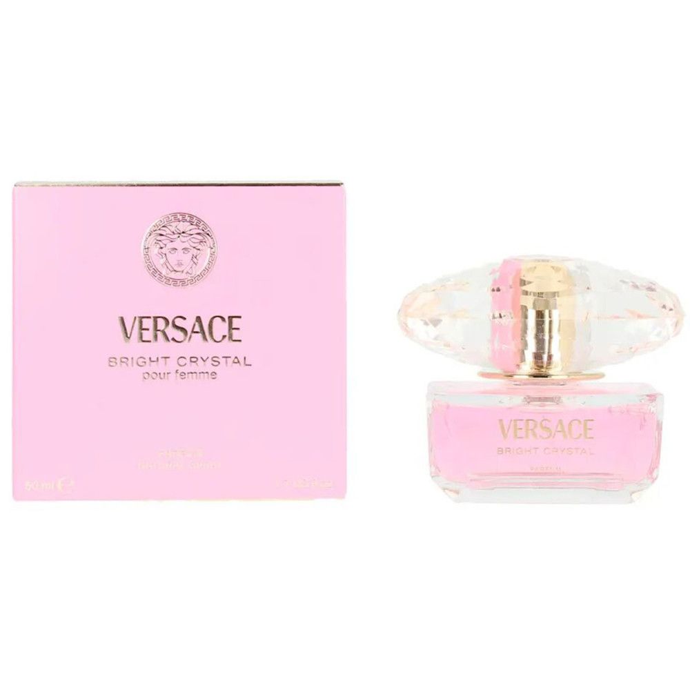 Flacon de parfum rose et boîte. La boîte porte la mention "Versace Bright Crystal pour femme". Le flacon a un bouchon en cristal.