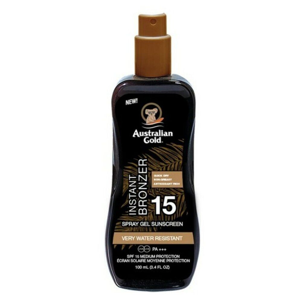 Flacon noir de spray solaire. Inscriptions: Australian Gold, Instant Bronzer, SPF 15, très résistant à l'eau. Avec pulvérisateur.