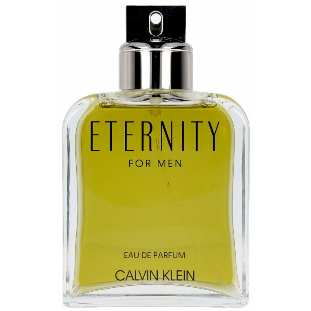 Flacon en verre avec liquide jaune. Inscription noire: ETERNITY FOR MEN, Eau de Parfum, CALVIN KLEIN. Tête de pulvérisation argentée.