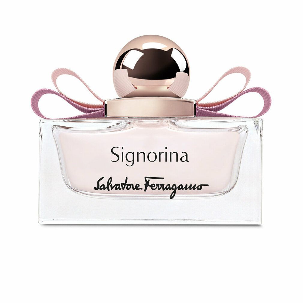 Parfumfles met roze strik en dop. Opschrift Signorina en Salvatore Ferragamo.