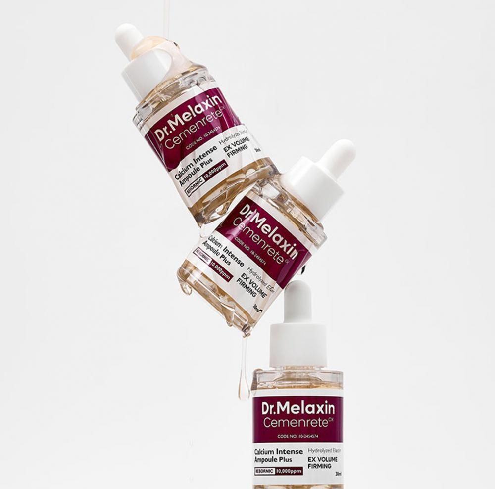 Deux ampoules Dr. Melaxin Cemenrete, l'une dégouline sur l'autre.