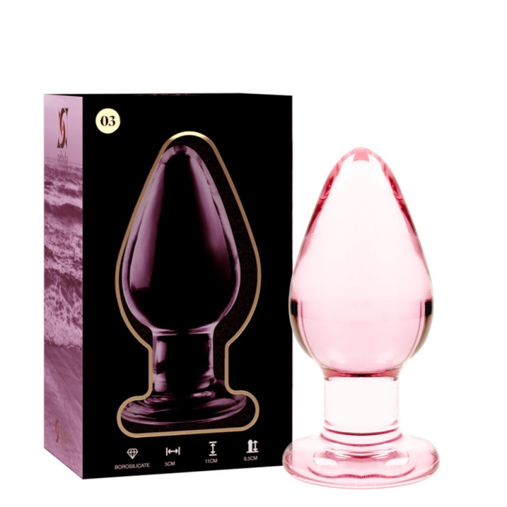 Plug anal en verre rose avec une base large, 11 cm de long, 5 cm de large.
