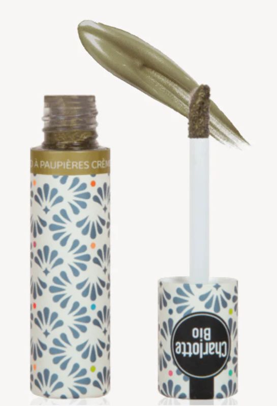 Ombre à paupières verte Charlotte Bio. Flacon décoré floral, applicateur avec produit. Texte: Charlotte Bio.