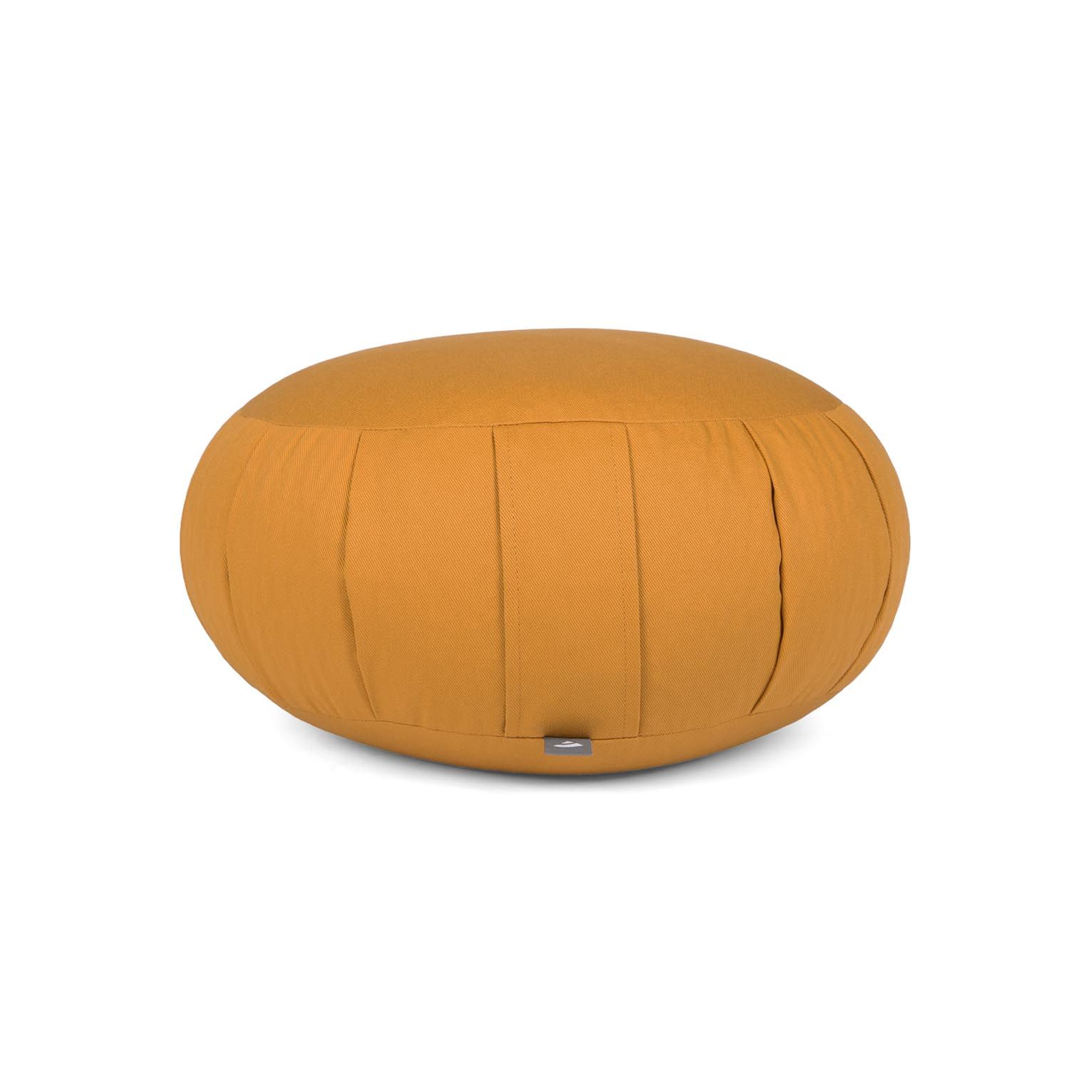 Rond meditatiekussen, mosterdkleurig. Stoffen hoes met verticale naden. Klein label aan de zijkant.